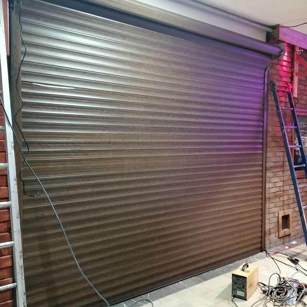 قیمت درب کرکره‌ای برقی اتوماتیک فروشگاهی در تبریز