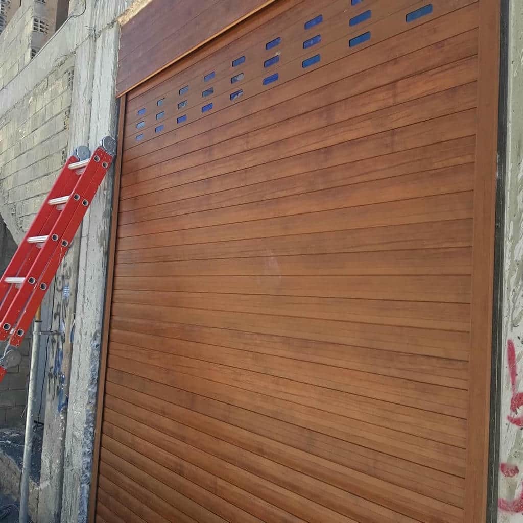 خرید درب کرکره‌ای برقی اتوماتیک پارکینگ در ایرانشهر