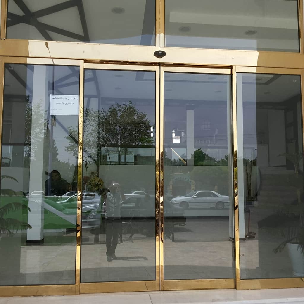 درب کشویی اتوماتیک شیشه ای با غلطک روان و کم صدا