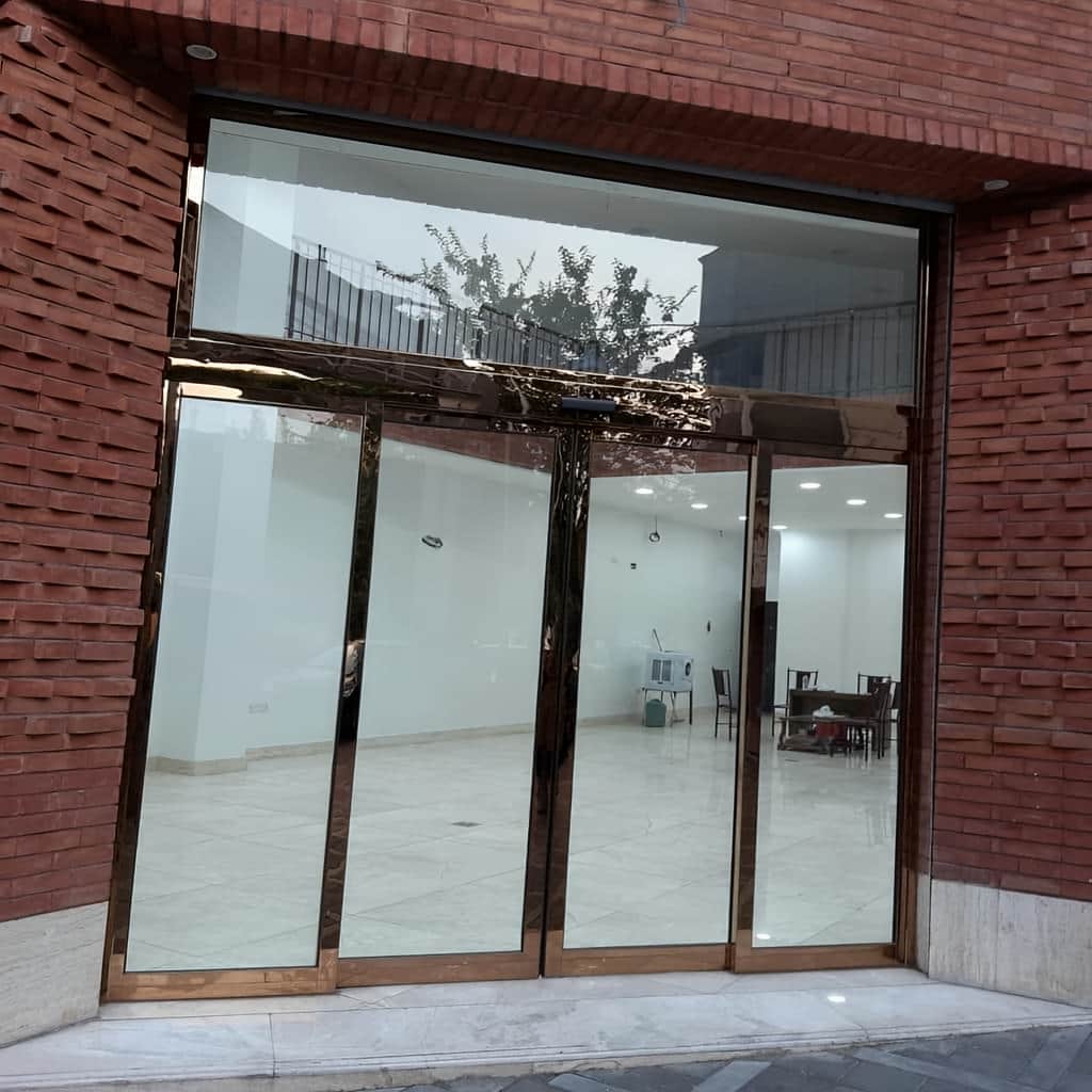 قیمت درب شیشه ای کشویی با موتور آرام