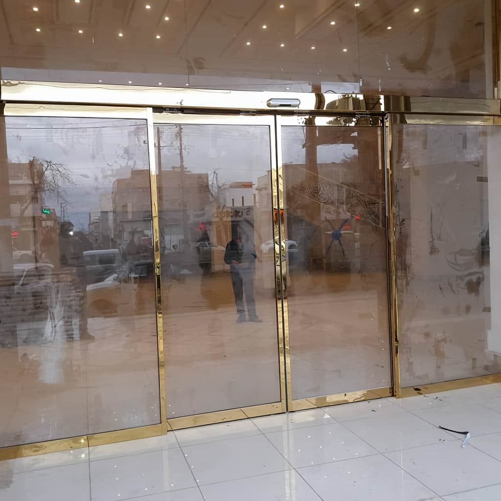 خرید درب اتوماتیک شیشه ای لولایی سنسوردار تکلنگه