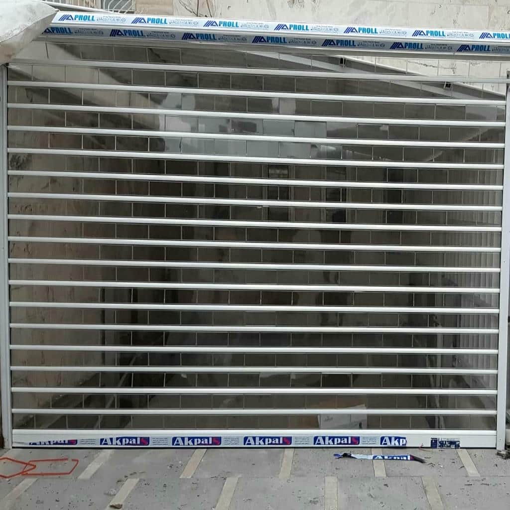 نصب درب کرکره ای برقی مغازه با ریل جانبی مناسب